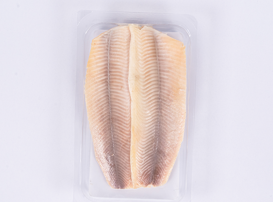 Smoked trout fillets in a clear retail tray